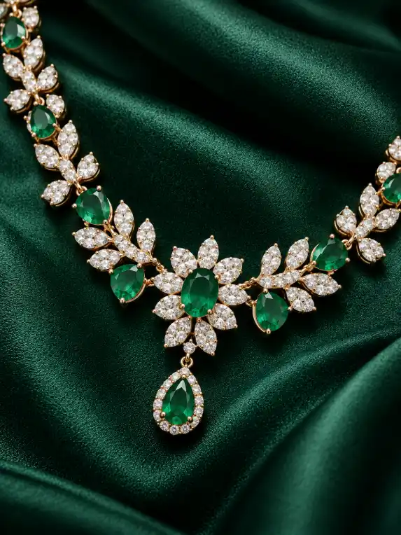Luxury necklace close-up on deep emerald satin