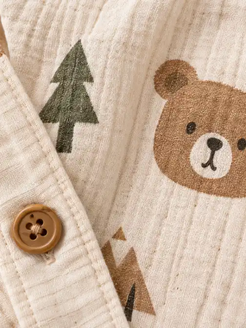 Kids clothing hanging on a wooden hanger with a circular close-up showing the exact fabric texture against a warm neutral background.