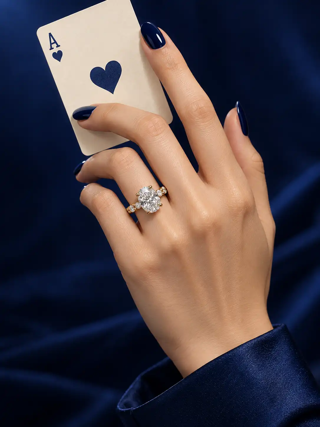 oval diamond ring, gold ring, diamond jewelry, ring product photography, jewelry photography, AI product photography, jewelry AI prompt, model hand jewelry, luxury ring photography, engagement ring, navy jewelry campaign, product photography prompt, ChatGPT image prompt, Gemini image prompt